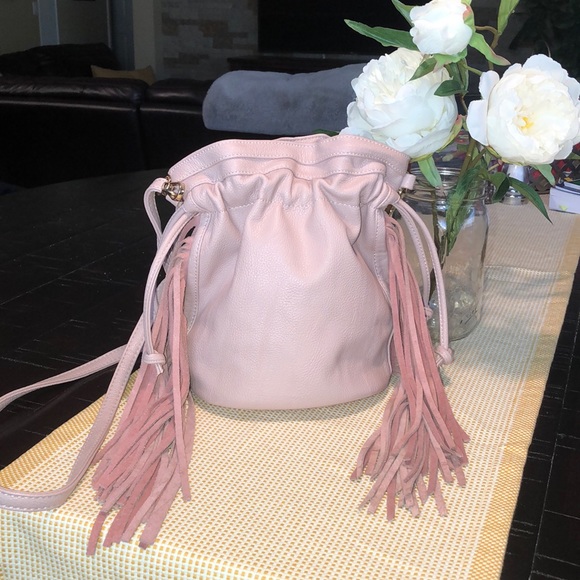 Boutique Handbags - EUC pink vegan leather fringe bucket crossbody bag